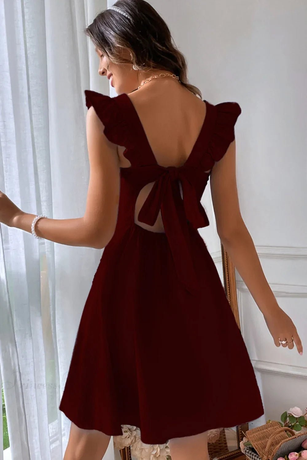 Bianca Sleeveless Mini Dress with Ruffle Tie-back